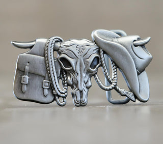 Buckingham Pewter Roped and Wrangled belt buckle featuring a detailed skull and cowboy gear design