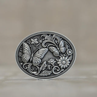 Custom butterfly belt buckle by Buckingham Pewter with intricate floral and butterfly designs