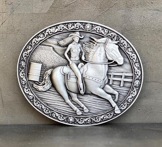 Jessica's Pride belt buckle featuring a detailed equestrian design of a rider on a horse