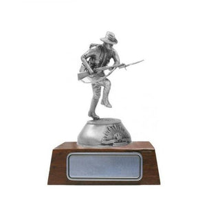 Charging Digger figurine in pewter, handcrafted by Buckingham Pewter, featuring a soldier in action on a wooden base