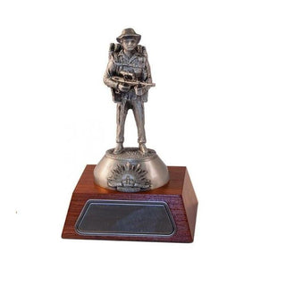 Australian handmade Somali Pewter Figurine on a wooden base, detailed soldier design.
